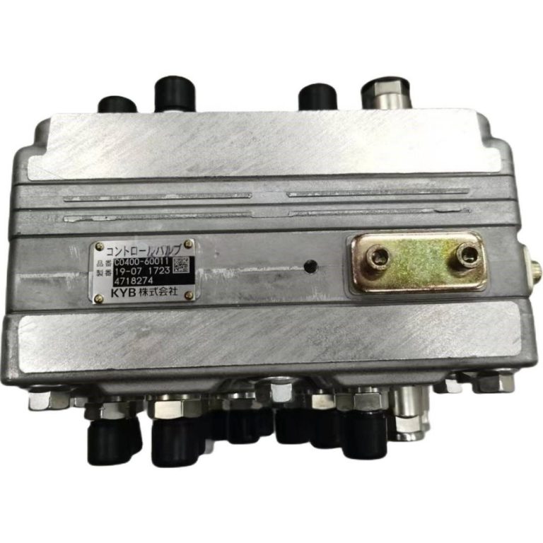Hitachi KYB 4718274 excavator shuttle signal valve block with multiple capped hydraulic ports