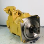 307-3063 variable displacement piston pump for CAT 416F 422F 428F 434F backhoes - three quarter view on the bench